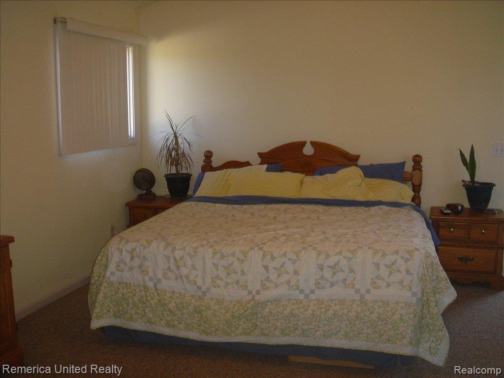 58600 12 Mile Road New Hudson, MI 48165 - Photo 12 of 14 Master Bedroom