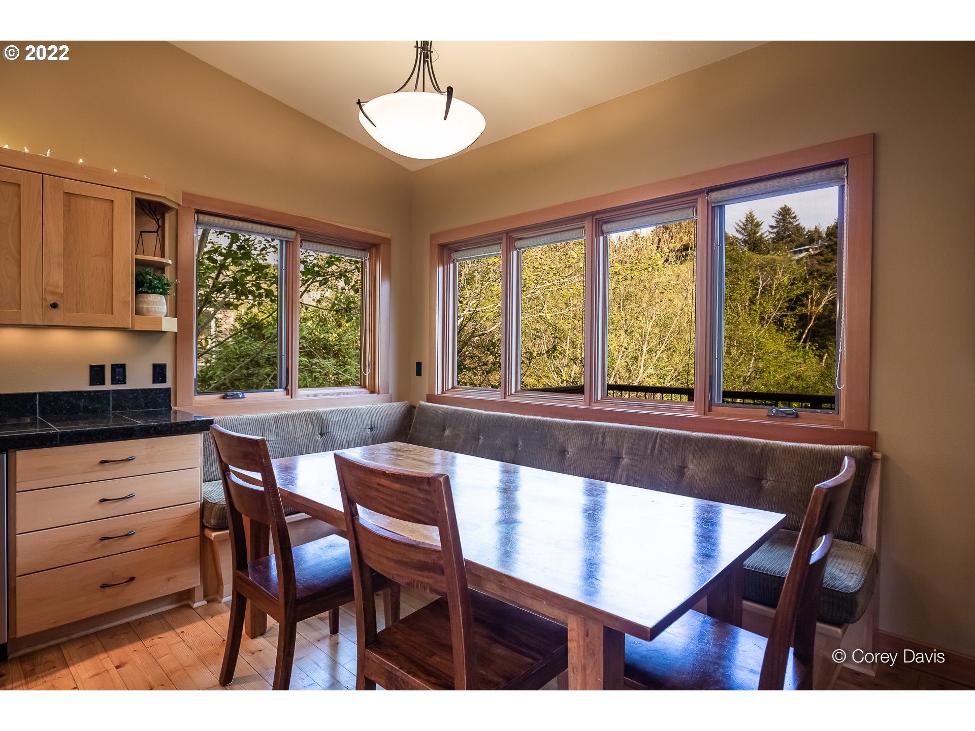 8185 Nehalem Road Manzanita, OR 97130 - Photo 16 of 31 a view of a dining room with furniture window and outside view