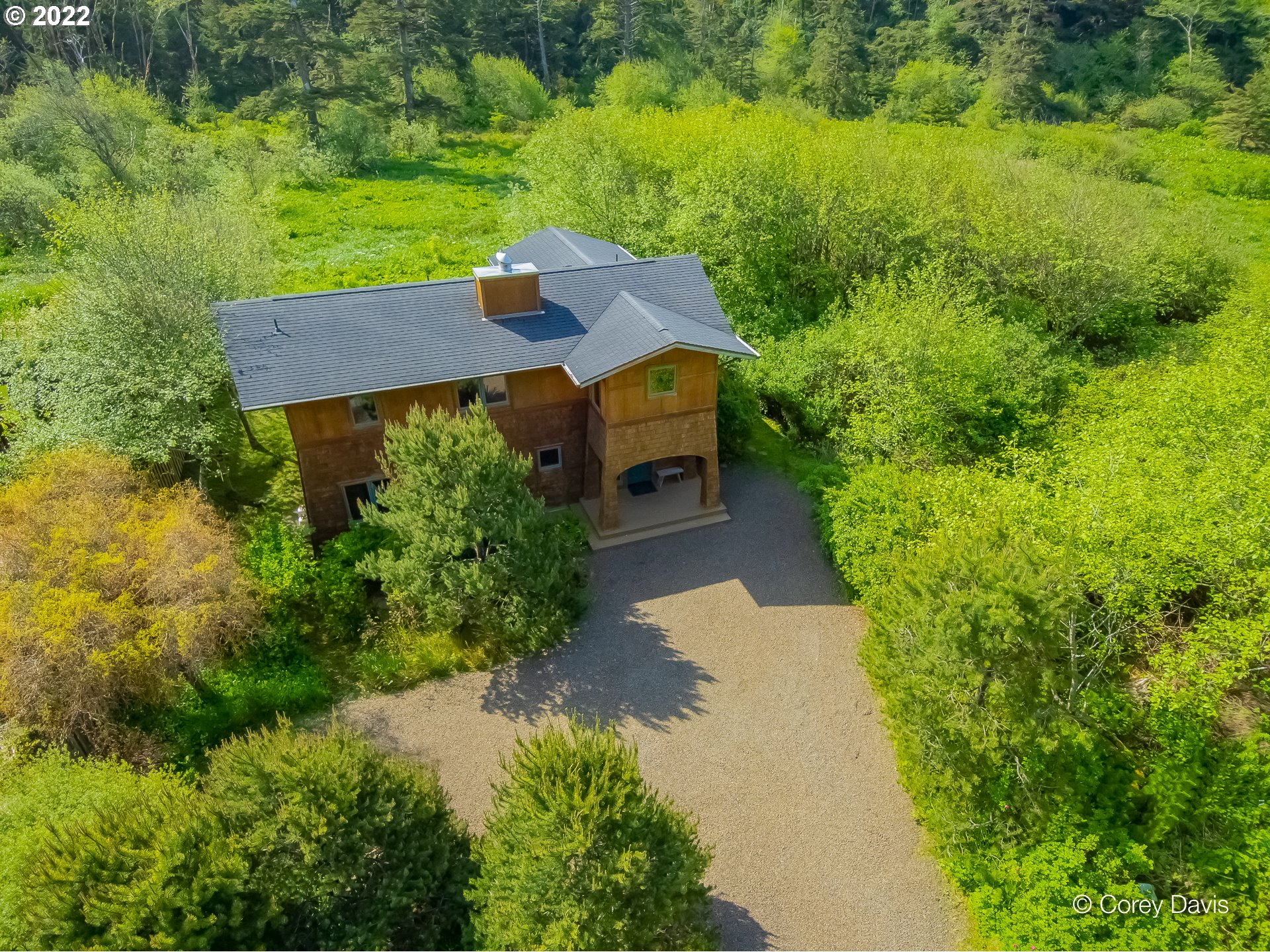 8185 Nehalem Road Manzanita, OR 97130 - Photo 2 of 31 an aerial view of a house with a yard