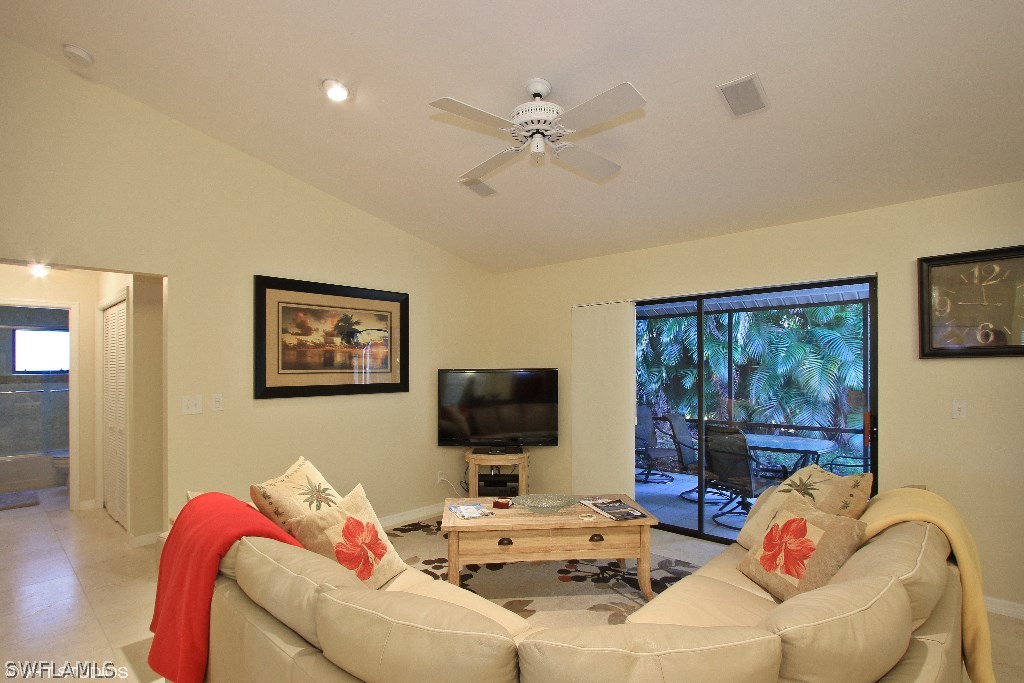 13266 Heather Ridge Loop Fort Myers, FL 33966 - Photo 2 of 12 a living room with furniture and a flat screen tv