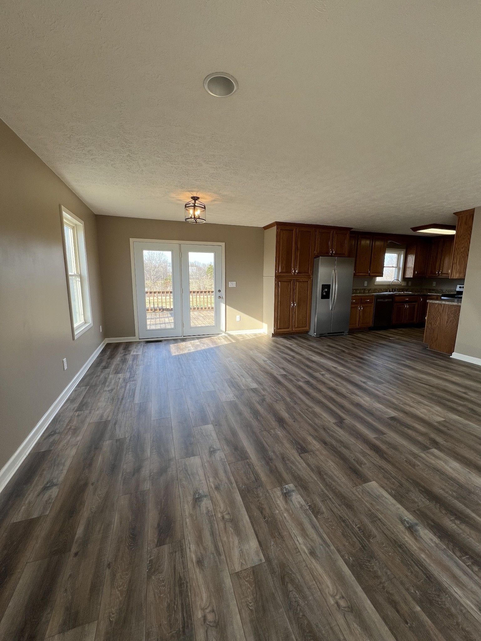1109 W Road Red Boiling Springs, TN 37150 - Photo 3 of 14 a big room with wooden floor and windows