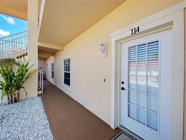 a utility room with closet dryer and washer