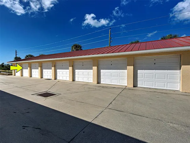 a front view of a house with a garage