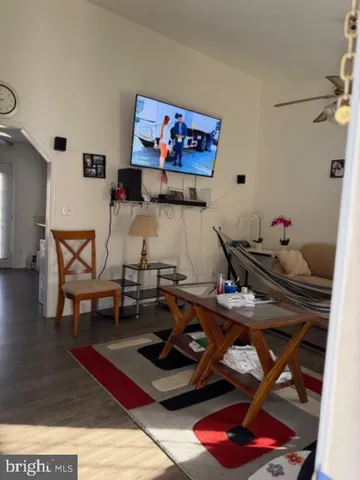 a room with furniture and wooden floor