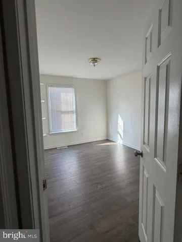 a view of livingroom with hardwood floor and window