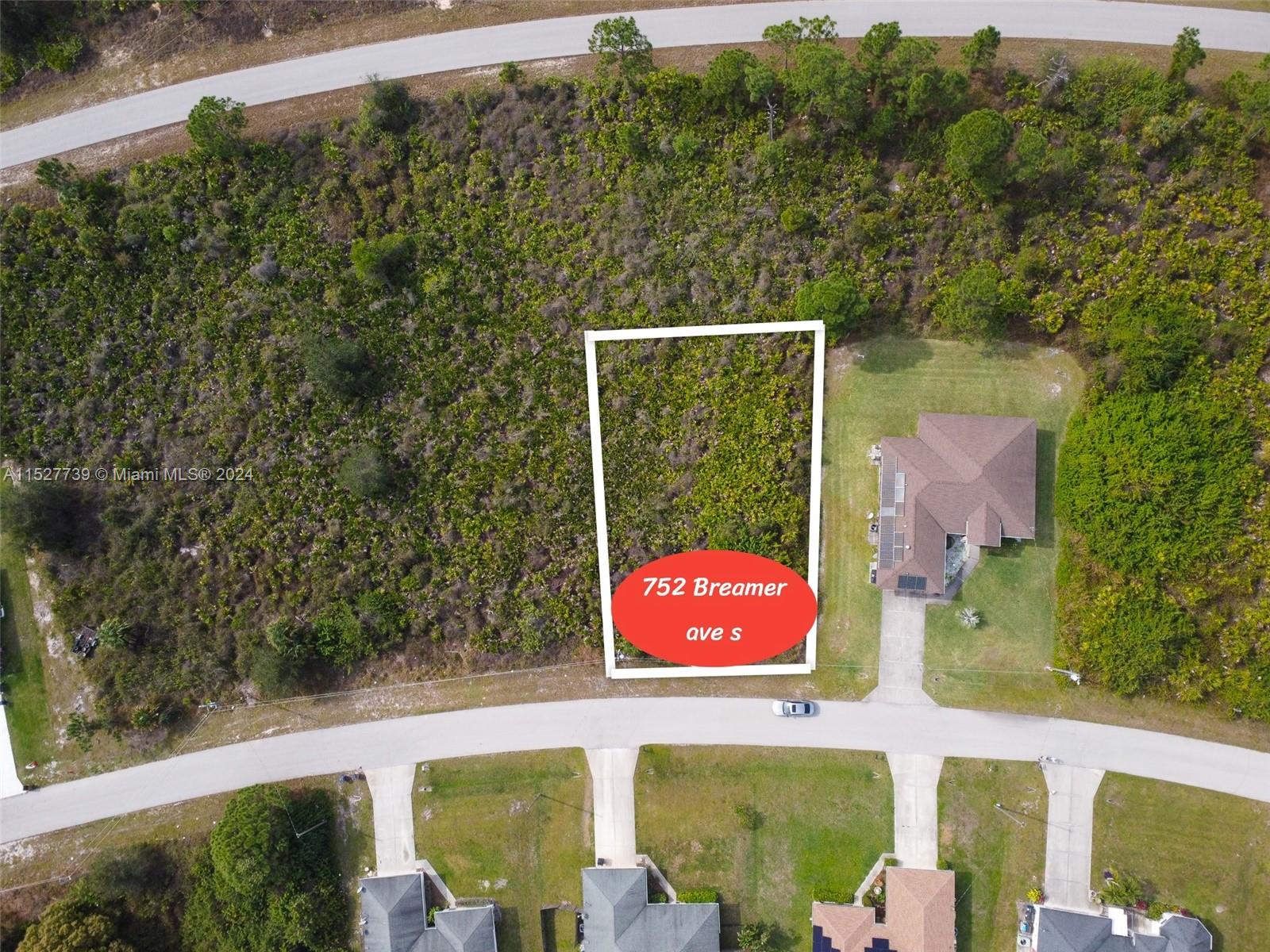 752 Breamer Avenue South Lehigh Acres, FL 33974 - Photo 4 of 10 view of an outdoor space