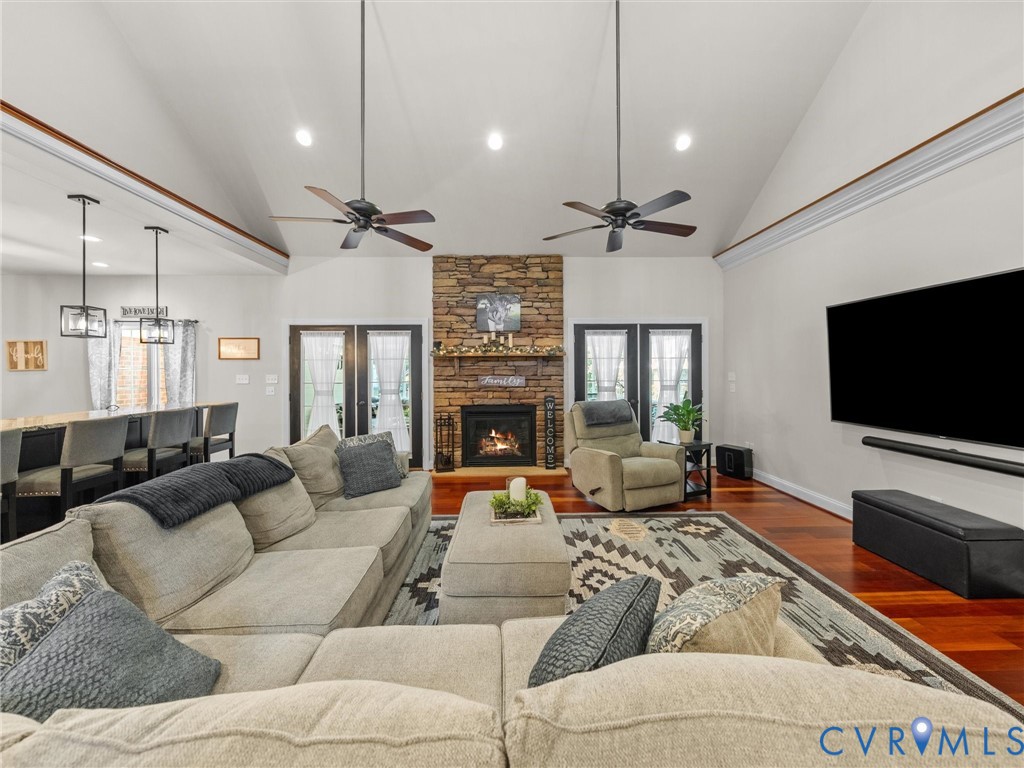 12710 Ivey Mill Road Chesterfield, VA 23838 - Photo 23 of 57 Vaulted ceiling with dual ceiling fans, stone-clad