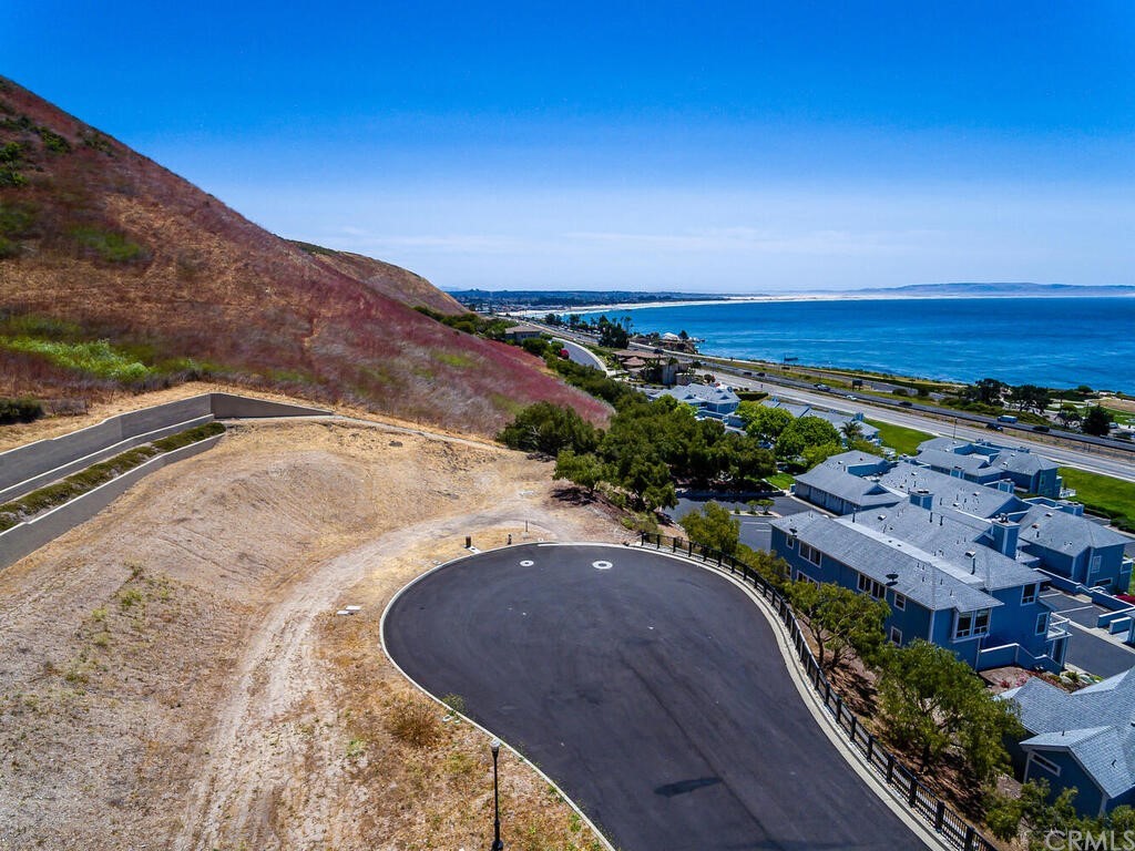1253 Costa Brava Pismo Beach, CA 93449 - Photo 4 of 13 a view of a swimming pool with an ocean view