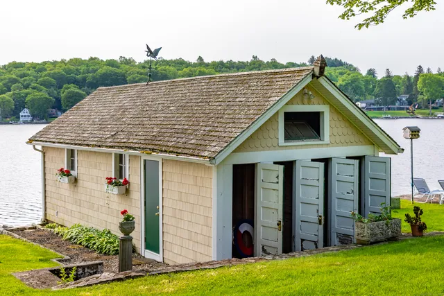 a front view of a house with yard