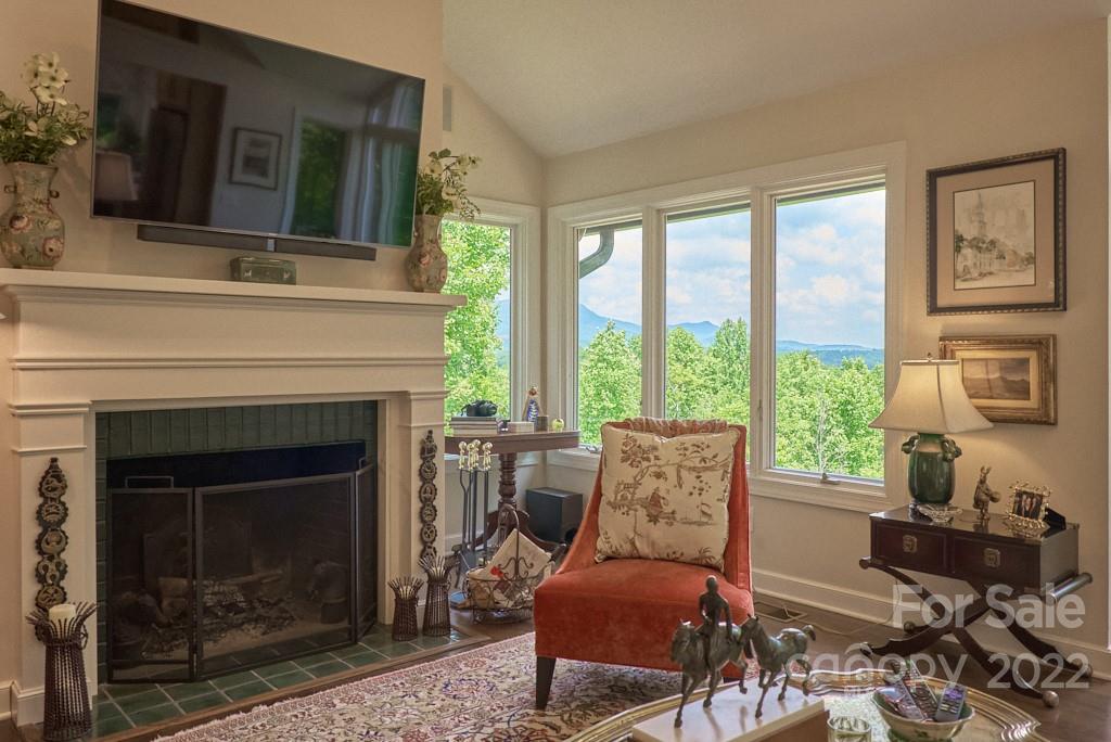 400 Ridgetop Road Tryon, NC 28782 - Photo 13 of 39 a living room with furniture and a fireplace