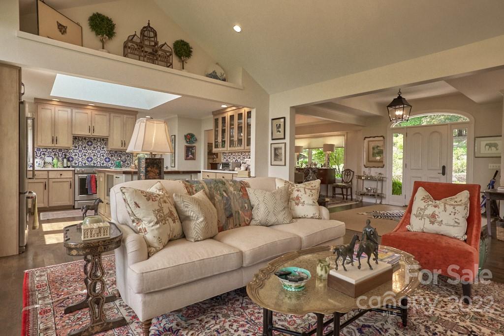 400 Ridgetop Road Tryon, NC 28782 - Photo 15 of 39 a view of a living room filled with furniture and a large window