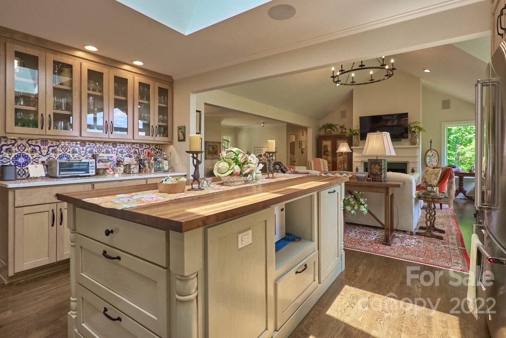 400 Ridgetop Road Tryon, NC 28782 - Photo 22 of 39 a kitchen with sink stove and cabinets