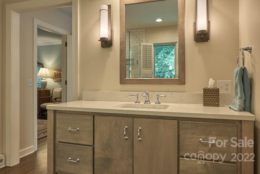 400 Ridgetop Road Tryon, NC 28782 - Photo 29 of 39 a bathroom with a sink and a mirror