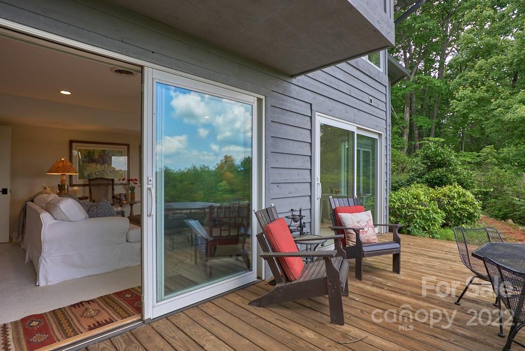 400 Ridgetop Road Tryon, NC 28782 - Photo 32 of 39 a patio with patio couch and table