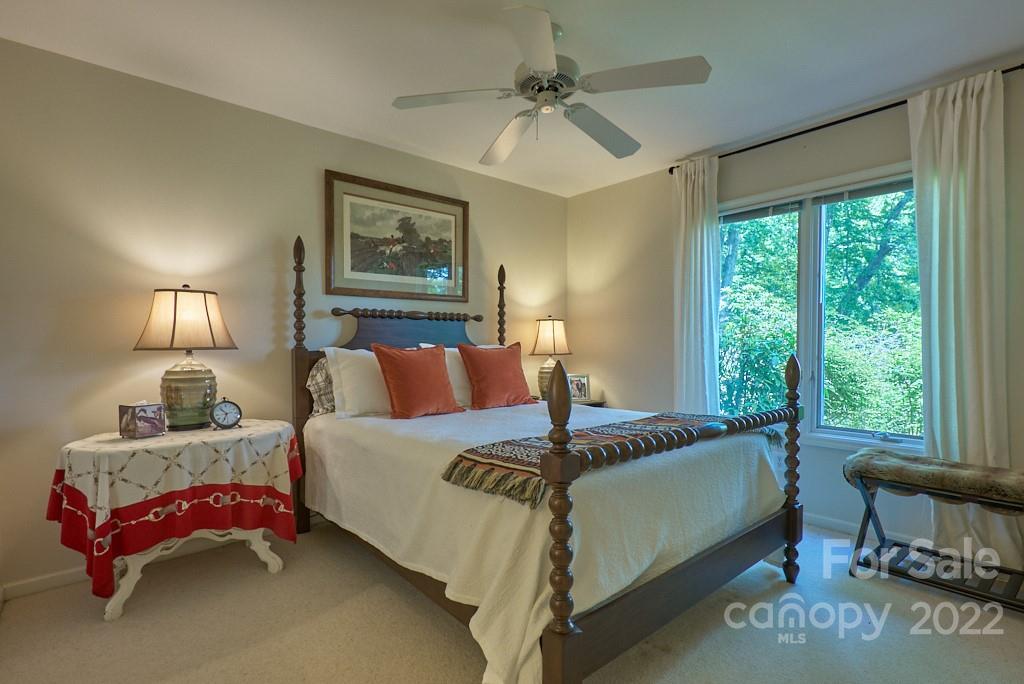 400 Ridgetop Road Tryon, NC 28782 - Photo 37 of 39 a bedroom with bed and a window