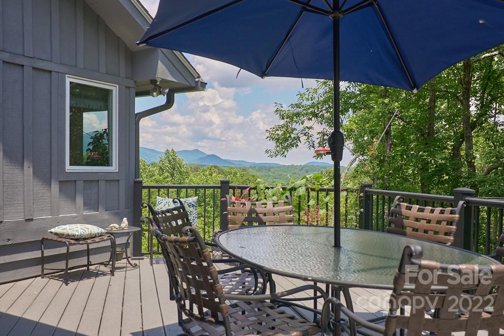 400 Ridgetop Road Tryon, NC 28782 - Photo 4 of 39 a view of balcony with furniture and outdoor seating