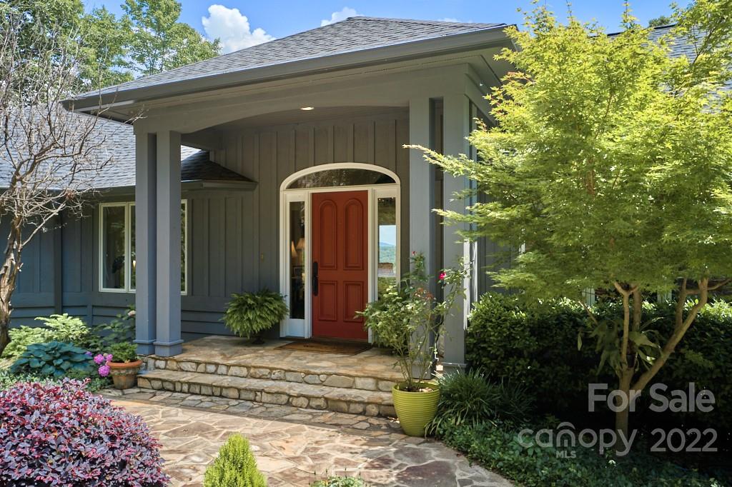 400 Ridgetop Road Tryon, NC 28782 - Photo 8 of 39 a front view of a house having yard