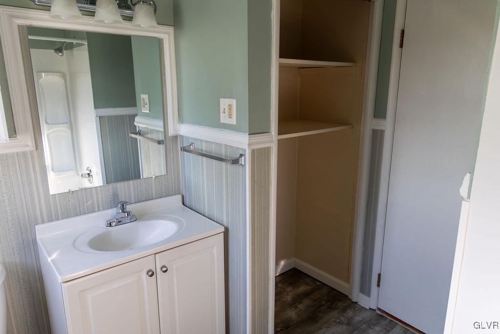 574 Bangor Road Easton, PA 18040 - Photo 17 of 39 a bathroom with a sink and a mirror