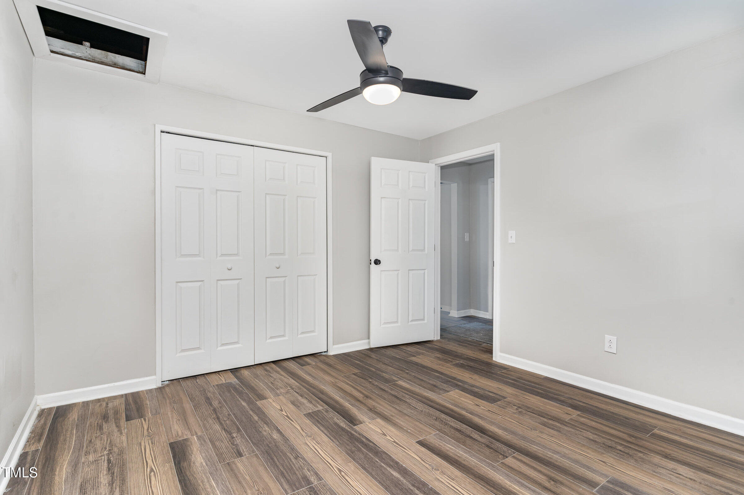 1323 Camden Road Fayetteville, NC 28306 - Photo 21 of 30 a view of empty room with wooden floor