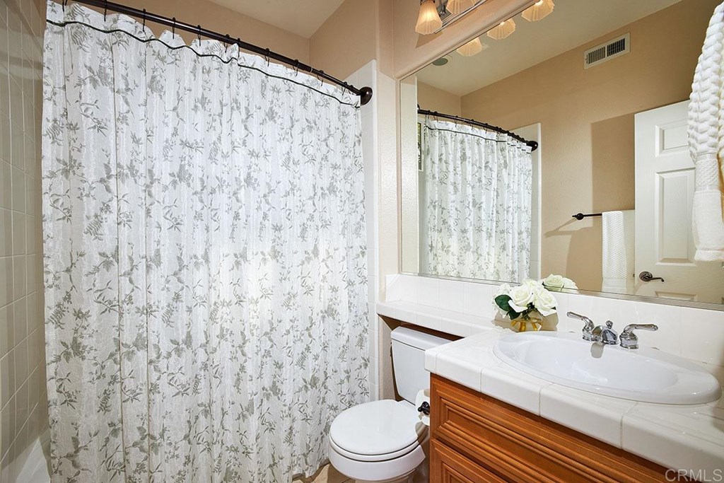 1226 Mariposa Road Carlsbad, CA 92011 - Photo 22 of 33 Downstairs Bathroom