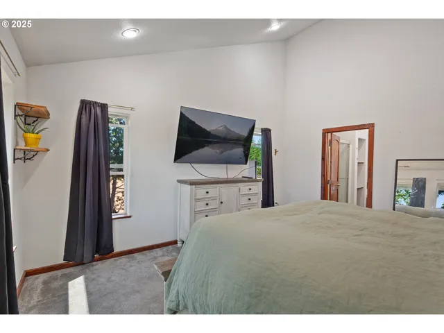 a bathroom with a sink a mirror and a bathtub