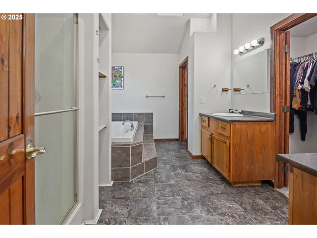 a bath tub sitting next to a window