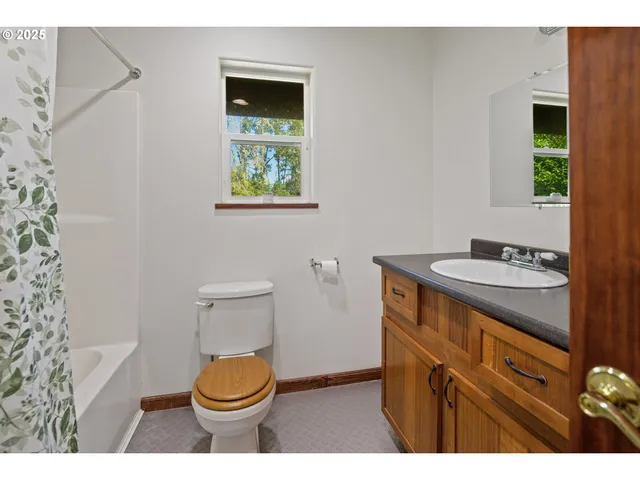 a room with gym equipment and windows