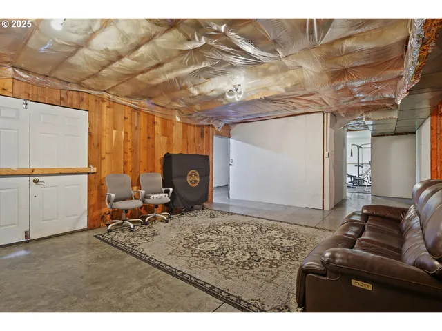 a bathroom with a bath tub and shower