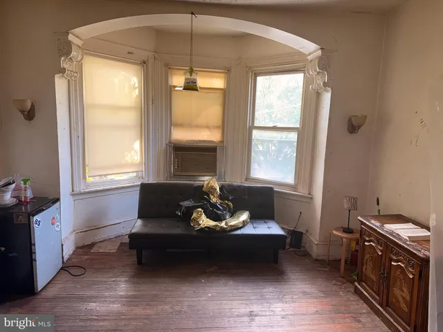 a bathroom with a sink a vanity and window