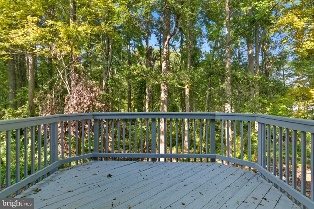 a view of balcony with wooden floor