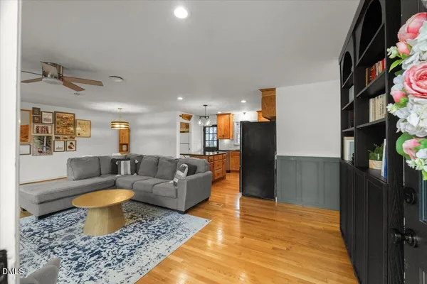 a living room with furniture and a rug