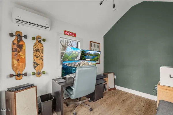 a view of a workspace with furniture