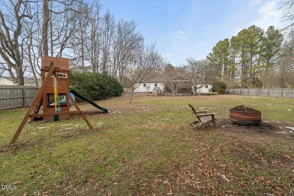 a view of a yard with a slide