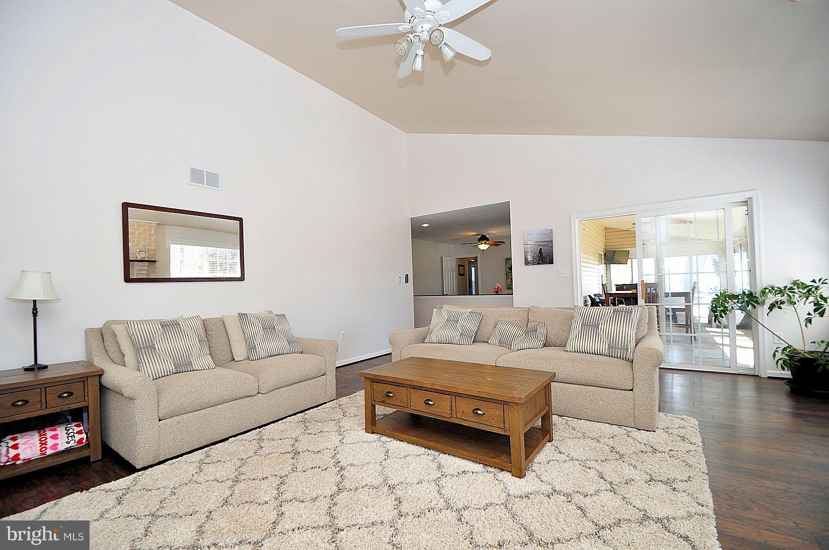 Family Room Offering Hardwood Floors