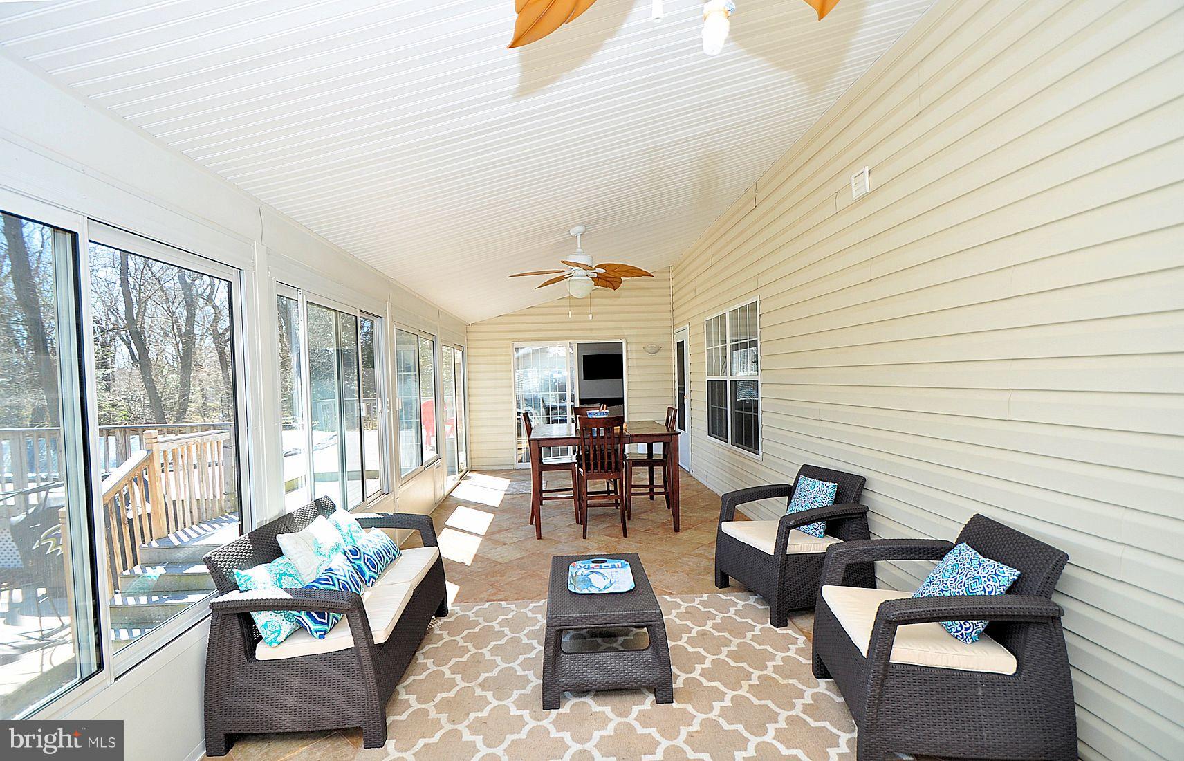 8445 Garland Road Pasadena, MD 21122 - Photo 10 of 30 Huge Sunroom for Additional Living Space