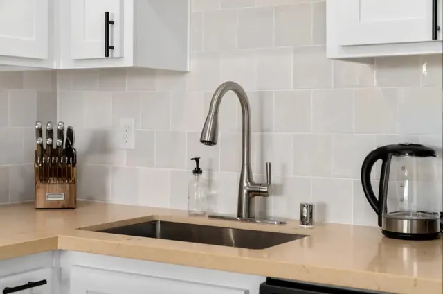 a bathroom with a sink and a bathtub