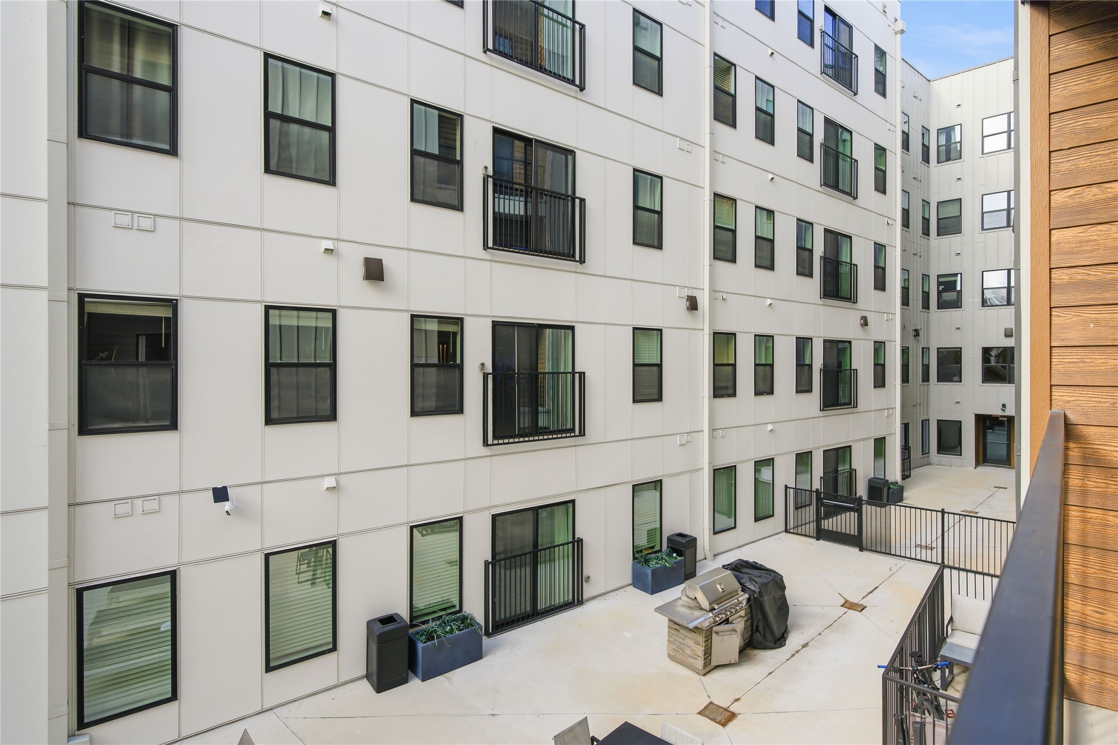 2500 Longview Street, Unit 219 Austin, TX 78705 - Photo 14 of 40 a view of a building with a outdoor space