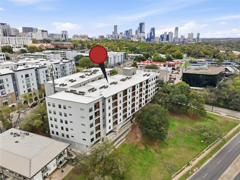 2500 Longview Street, Unit 219 Austin, TX 78705 - Photo 15 of 40 a view of a terrace with outdoor seating and city view