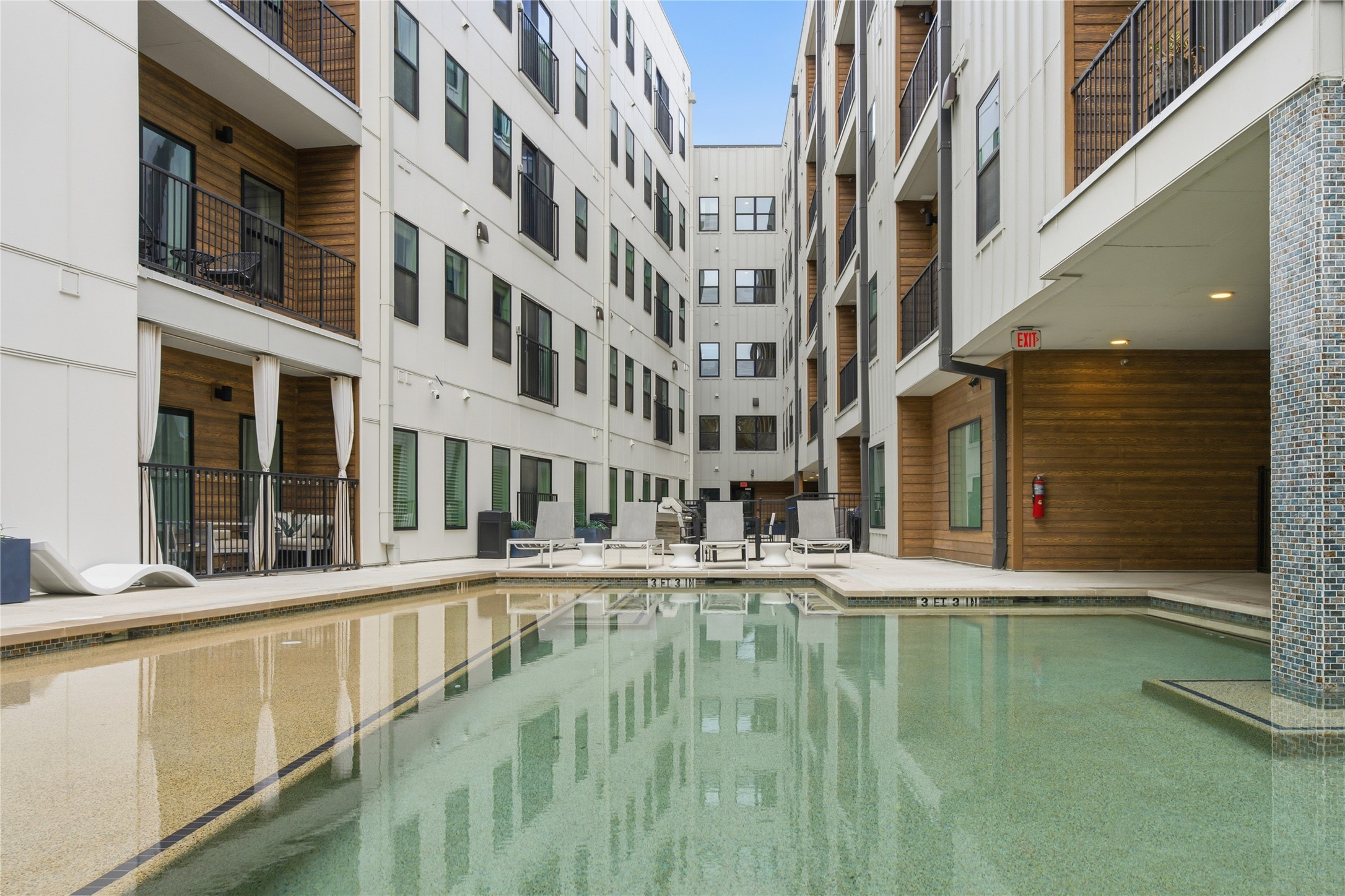 2500 Longview Street, Unit 219 Austin, TX 78705 - Photo 24 of 40 a view of an apartment with a swimming pool
