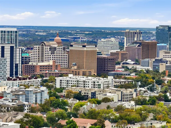 a view of a city with tall buildings