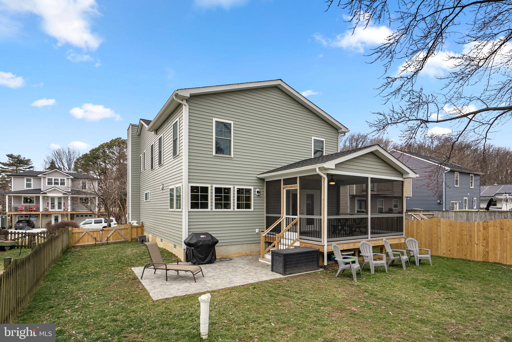 112 Elliott Place Edgewater, MD 21037 - Photo 35 of 56 Beautiful screened porch and paver patio