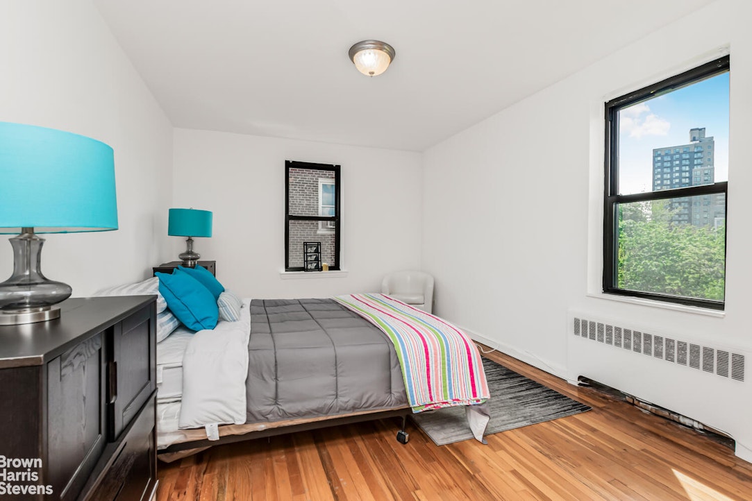 3840 Greystone Avenue, Unit 5L Bronx, NY 10463 - Photo 12 of 41 a bedroom with a bed and a window