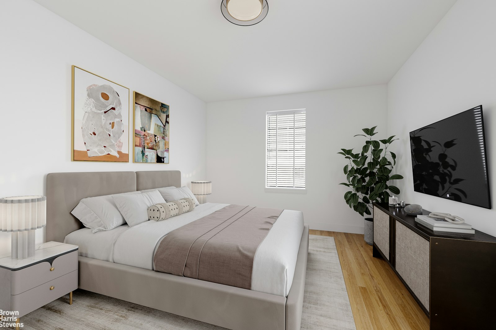 3840 Greystone Avenue, Unit 5L Bronx, NY 10463 - Photo 34 of 41 a bed room with a bed a couch and potted plant