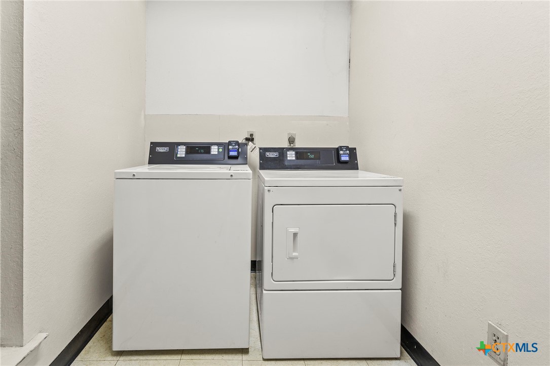 4701 Red River Street, Unit 102 Austin, TX 78751 - Photo 12 of 20 a utility room with dryer and washer