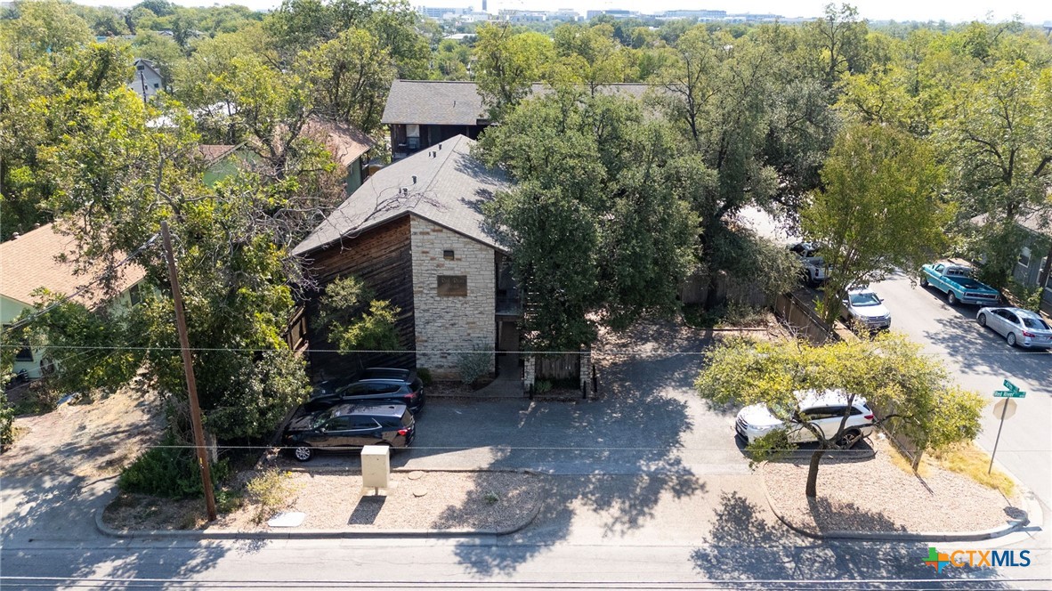 4701 Red River Street, Unit 102 Austin, TX 78751 - Photo 13 of 20 a view of a patio with table and chairs and potted plants
