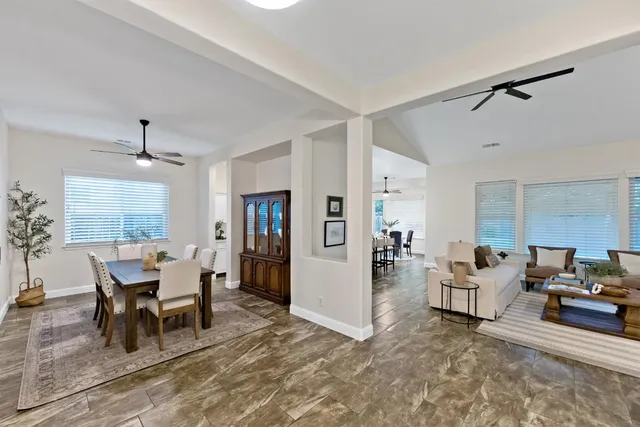 a view of a dining room with furniture