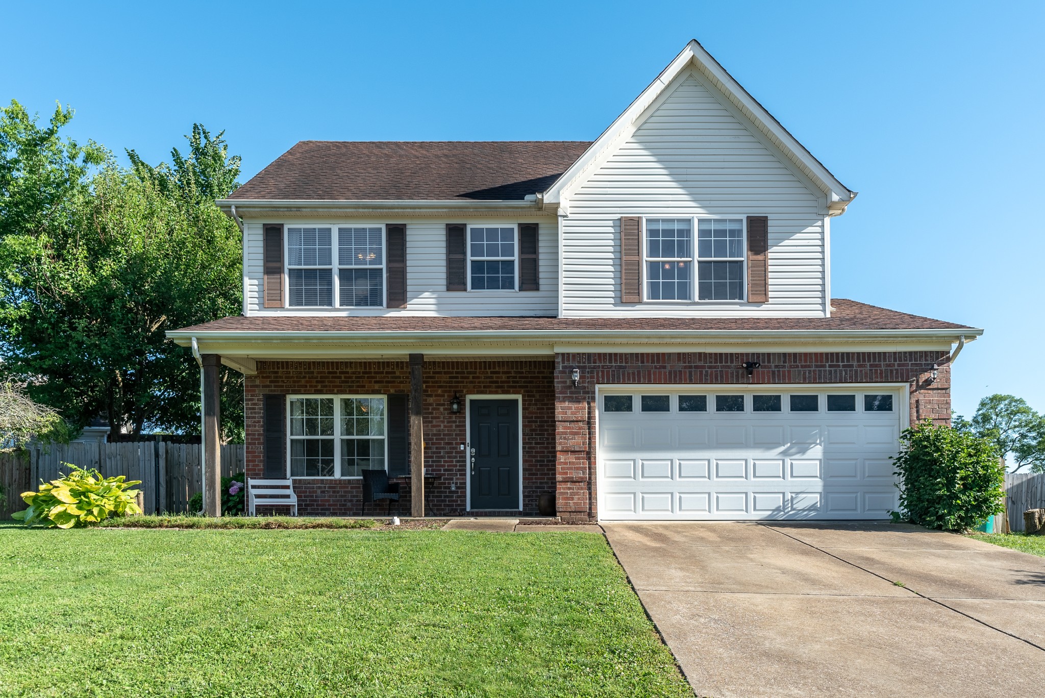 1707 Ginger Way Spring Hill, TN 37174 - Photo 1 of 39 a front view of a house with a yard