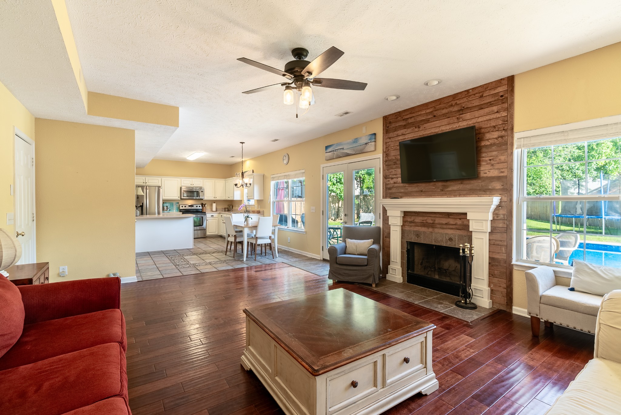 1707 Ginger Way Spring Hill, TN 37174 - Photo 11 of 39 a living room with furniture fireplace and a flat screen tv