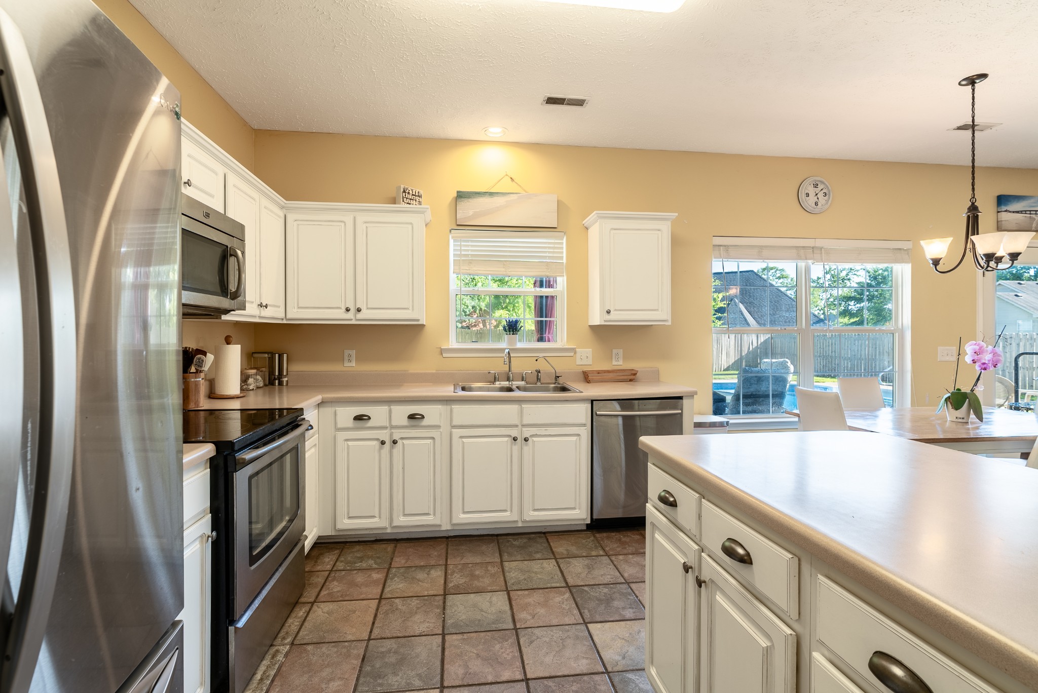 1707 Ginger Way Spring Hill, TN 37174 - Photo 16 of 39 a kitchen with a sink stove and cabinets
