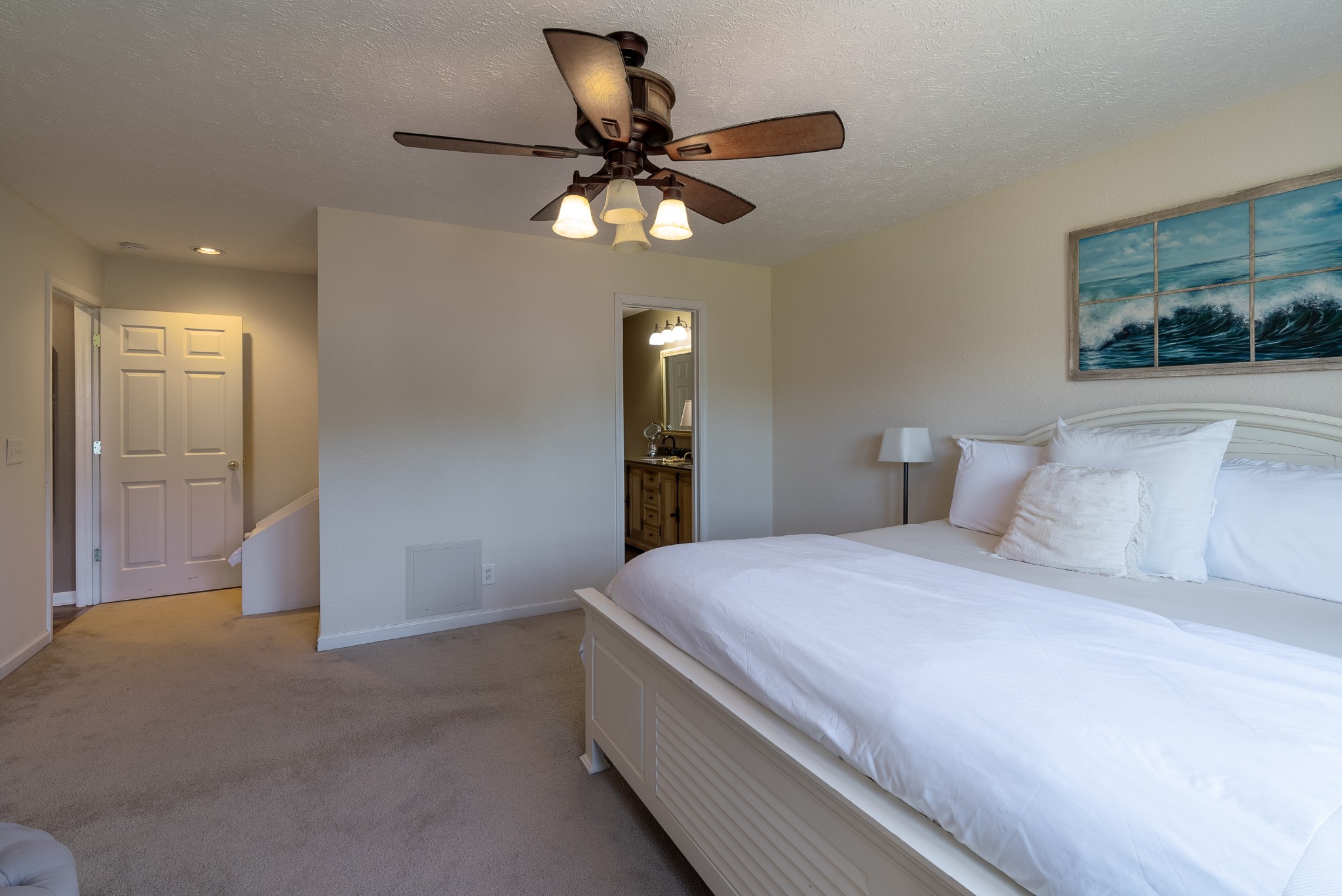 1707 Ginger Way Spring Hill, TN 37174 - Photo 20 of 39 a bedroom with a bed and a chandelier